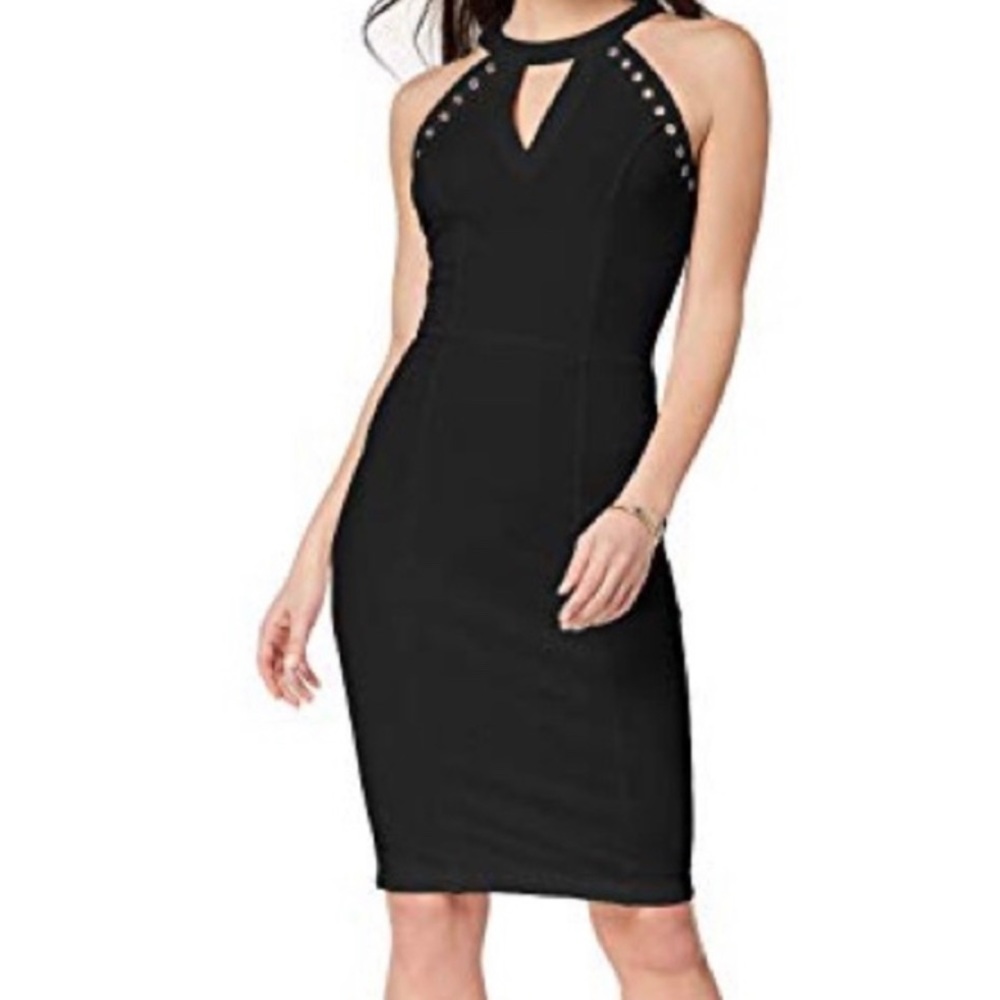 Black cocktail dress with neck cut out and silver detailing